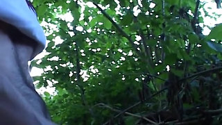 Italian amateur brunette handles two cocks in the countryside