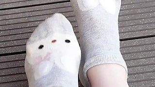 Socks Removal and Walk Barefoot on the Grass
