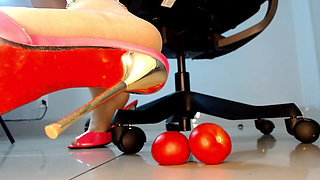 Domme Secretary Crushing Balls Tomatoes in High Heels