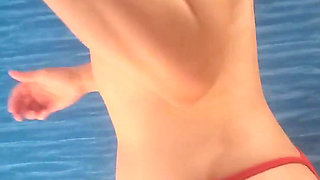 A Mature Woman in a Bikini