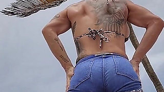 Giant Muscular Goddess on the Beach