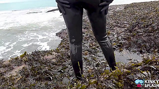 Rubbery Beach Encounter: Lucy's Neoprene Pussy Play with Stranger