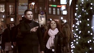 Sexy young redhead takes selfies in city lights