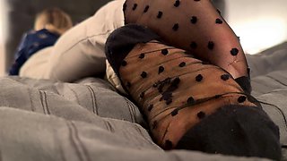 Busty brunette foot fetish and footjob in nylons