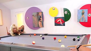 A blonde nymph with a tattoo likes doggystyle on a pool