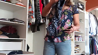 My stepmother tries on jeans while I masturbate, admiring her big ass and hairy pussy.