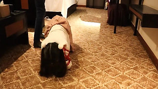 A Cute Little Dressed in a Jk Uniform Was Walking Around Barefoot on the Ground.