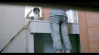 Dark haired asian chick pissing on