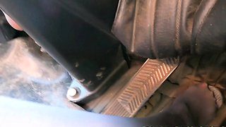 Amateur MILF seductress driving barefoot in pantyhose