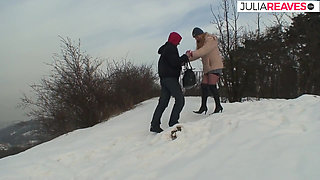 Sexy redhead rides a hard cock out in the cold snow