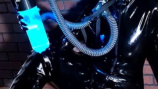 Kinky solo session with MILF freak in full body latex suit