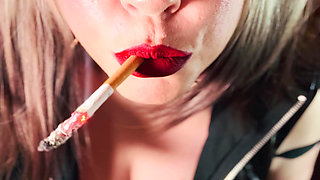 Miss Tina Snua Dressed In PVC & Smoking A Cork Cigarette With Lots Of Dangling, Snap Inhales, OMI & OME