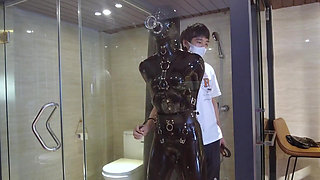Mz20 - the Girl in Latex Clothing Locked in a Glass Room