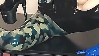 Latex Officer Fucks His Latex Prisoner with a Strap-on