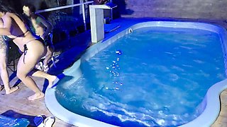 Caught in the act! Two brunettes get caught masturbating in the condo pool