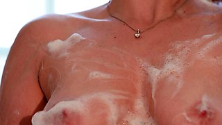 18 Year Old Redhead Gets Sensual In A Bubble Bath