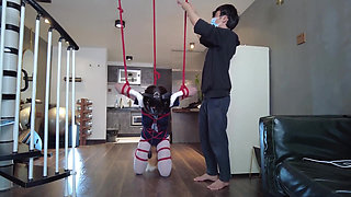 Mz31 - a Girl Tied and Suspended by a Red Rope Reaches Orgasm.