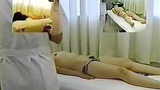Adorable Japanese enjoys a kinky voyeur erotic massage