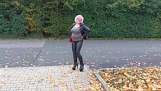 Naughty Granny Tongue Out Flashing Big Tits in Public