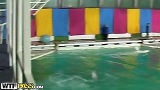 Cute and young brunette babe Natasha is getting seduced by her workmate at dolphinarium for naughty fuck.