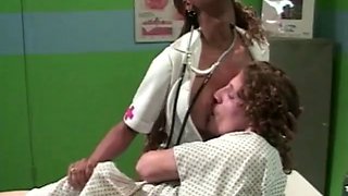 Ebony nurse attends to the patient