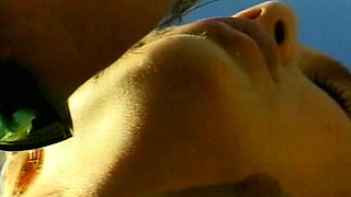 Facial cumshot for a hot blonde babe by the pool