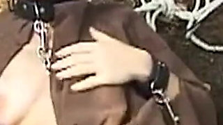 Hooded Mature Man Endures Clamps and Heavy Chains