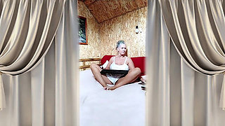 Hot Housewife Lukerya in Satin White Lingerie on a Large Soft Bed