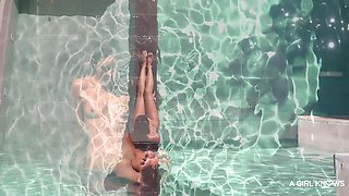 Alluring brunette explores passionate lesbian poolside play with intense adventure desire