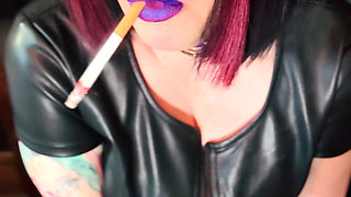 Queen Of Smoking Tina Snua Smoking A Cork Cigarette In Leather & Gloves