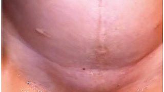 She Sits On The Toilet To Pee, And He Pisses All Over Her Pussy Before Rubbing Himself With Hers