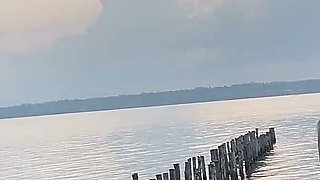 Naked Busty Blonde Risks a Walk Outdoors