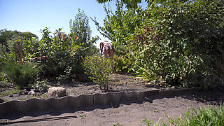 Watching Hot Neighbor Working in Garden