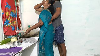 Aunty was cleaning the dishes in the kitchen wearing a saree and I went behind her and tied her up and had sex with her.