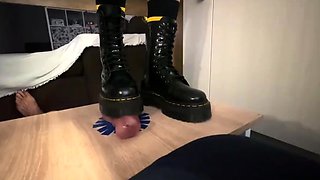 Dr Martens boots smashing slave balls on the Cockbox by