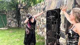 Double Female Domination with Already Heavy Bruised Slaven Who Receives More Corporal Punishment Outside in the Sun.