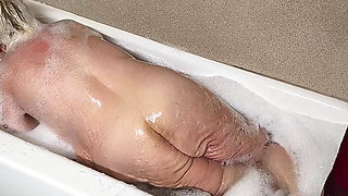 Naughty Bubbler Getting Soapy Masterbating in the Tub Her Pussy She Rubs