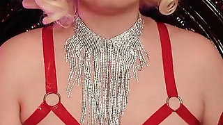 Sexy Pin up Girl Eating Donuts in Latex Gloves