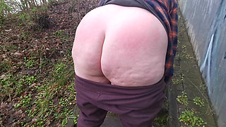 Spanking Her Naked Ass in the Forest