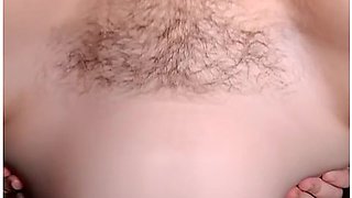 Close-Up of Strapon on Hairy Pussy
