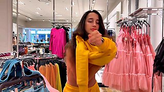 Busty Brunette Flashes in Store