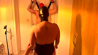 Femdom MILF dominates her caged plugged gimp