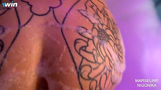 Feel Marseline's thrilling tattooed passion in a steamy jacuzzi