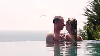 Kenna James captivates with youthful, fiery redhead allure