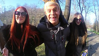 Two beautiful girls have an intense foursome with two guys in the open air