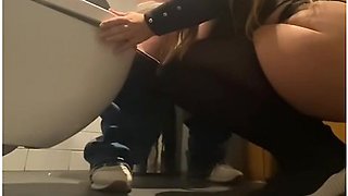Lesbian Mistress Fucks Straight Girl in Public Toilet