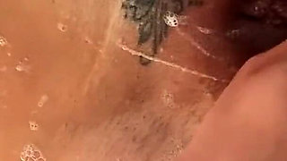 Neighbor wife showering and shaving her holes