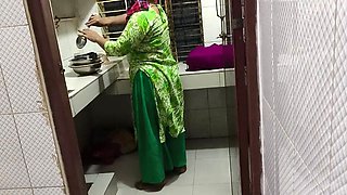 I suddenly see my aunty cleaning the dishes in the house