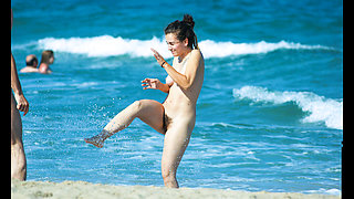 Naturist teenager is filmed outdoors