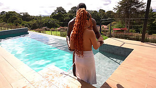 Colombian redhead Celeste Alba fucks her huge BBC boss by the pool